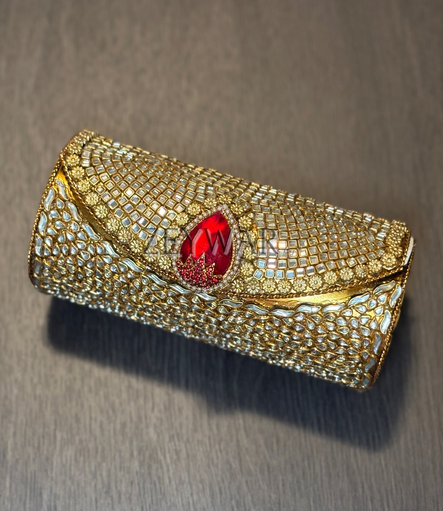 ADINA | Medium Cylinder Shaped Metal & Kundan Clutch