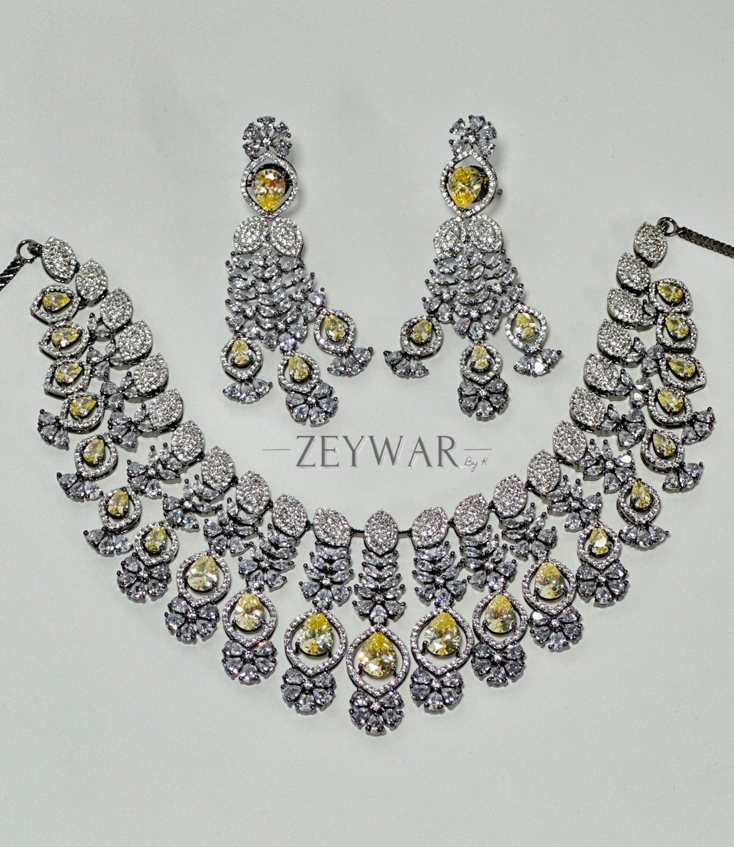 NAYAB | CZ Set with Yellow Details