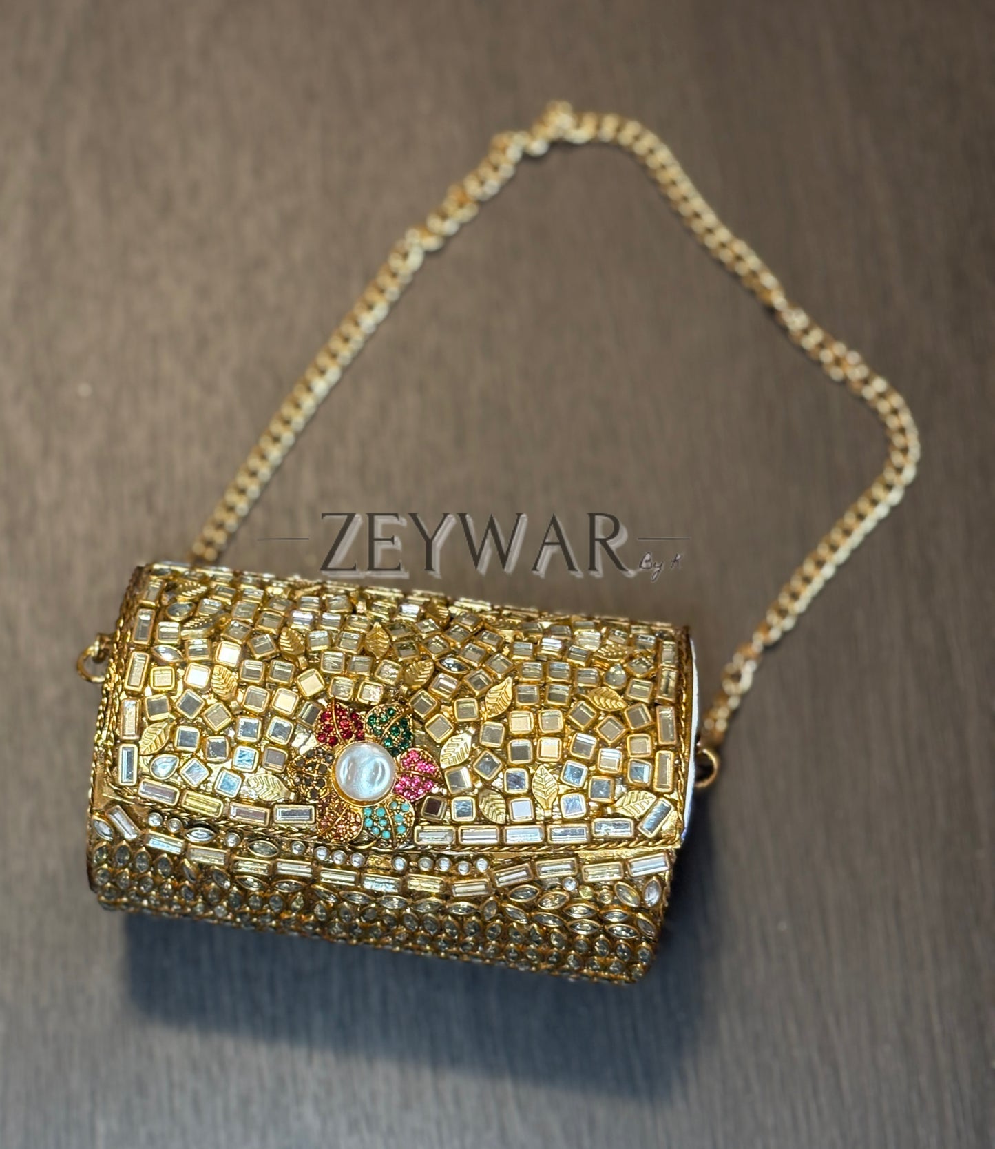 VANYA | Mini Cylinder Shaped Kundan & Metal Clutch